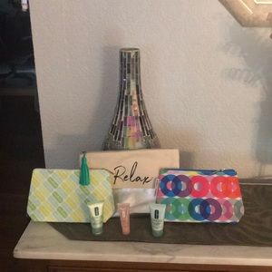 Three Makeup bags with some Clinique samples!!!